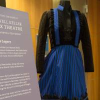 A blue dress costume on display.